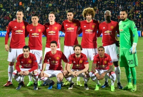 Players of Manchester United pose before their first leg, round of 16 UEFA Europa League football between Rostov and Manchester United at Olimp-2 arena in Rostov-on-Don on March 9, 2017. / AFP PHOTO / Alexander NEMENOV (Photo credit should read ALEXANDER NEMENOV/AFP/Getty Images)